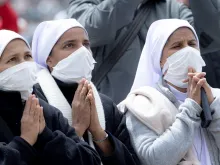 Religious sisters pray during the Regina caeli with Pope Francis in St. Peter's Square May 2, 2021.